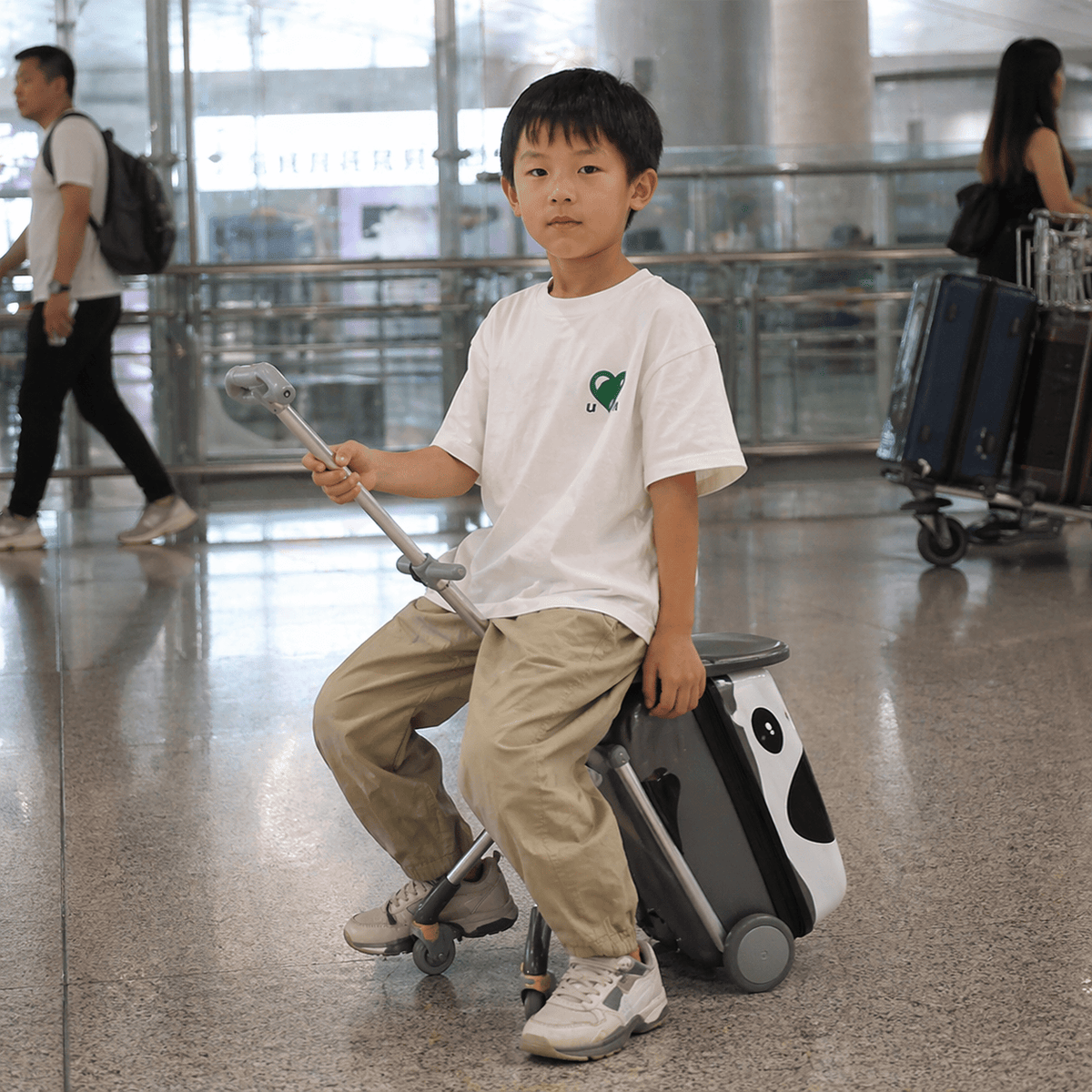 Valise enfant à roulettes et siège