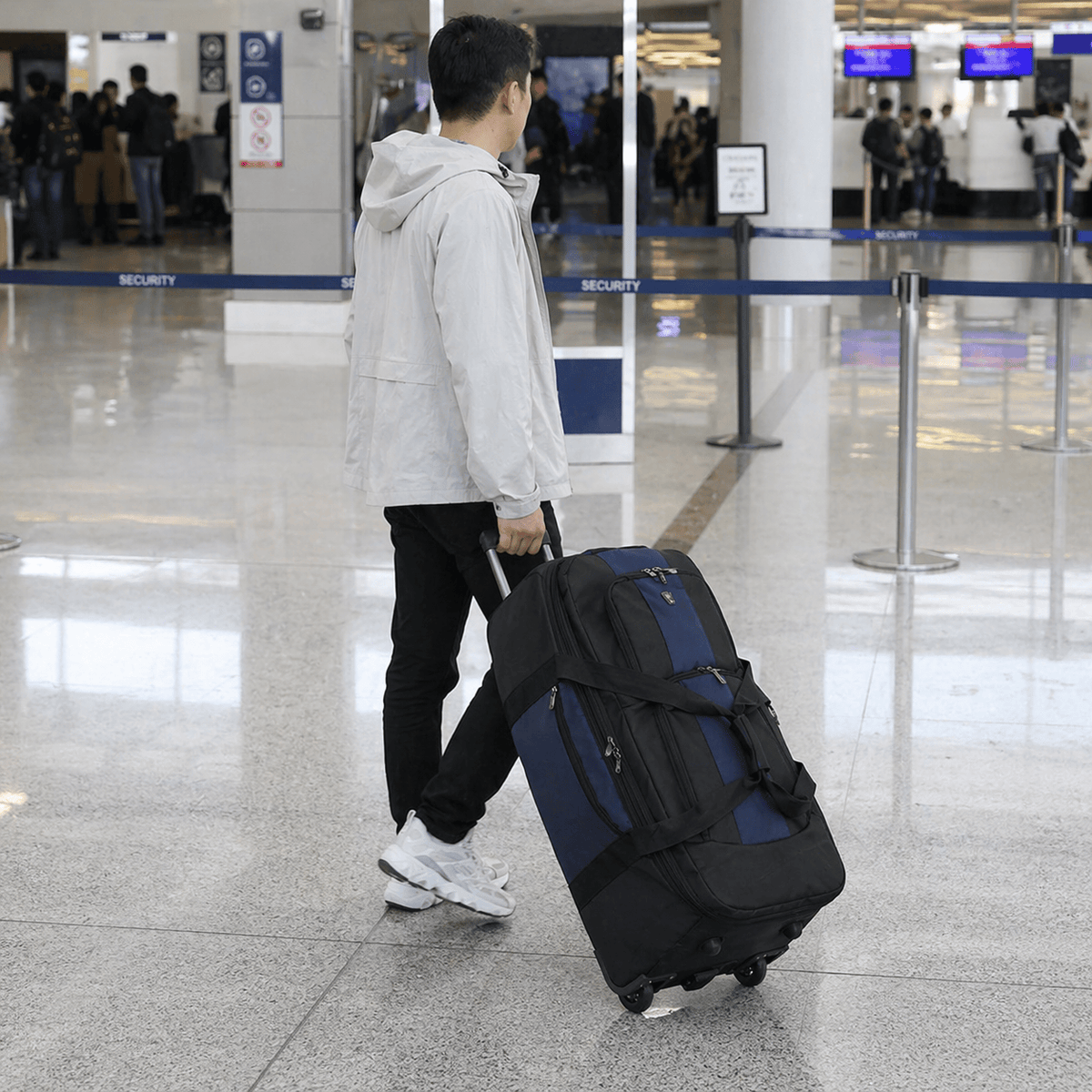 Valise souple roulettes